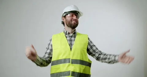 Construction Worker Celebrates Project Success With Joy and Enthusiasm Stock Footage 344271599
