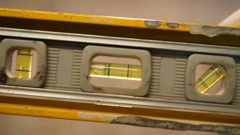 Construction Worker checking Level tool device. Job. Stock Footage 126328239