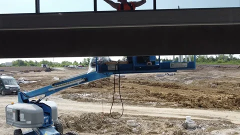 Construction worker in Cherry Picker Stock Footage 158895721