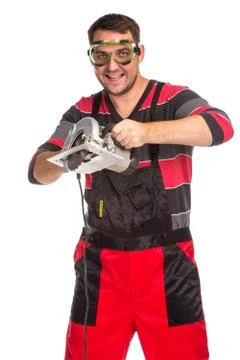 Construction Worker with circular saw Stock Photos