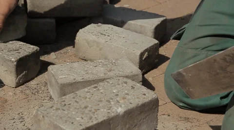 Construction worker cleaning bricks Stock Footage 34974633