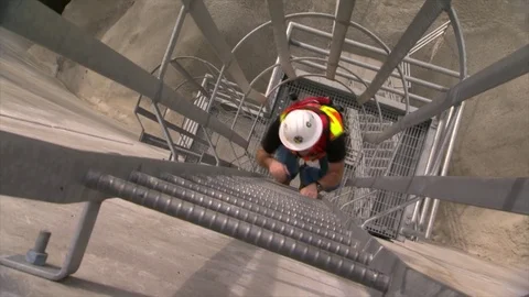 Construction worker climbing ladder Stock Footage 78011265