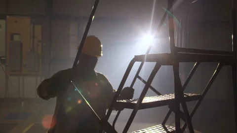 Construction Worker Climbs Portable Steps Video stock 127329321