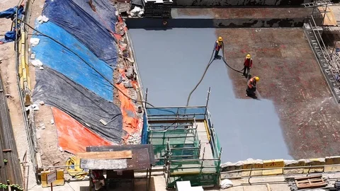 Construction worker coating epoxy spray paint Stock Footage 126384542
