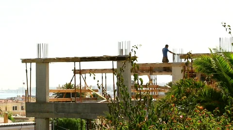 Construction Worker Coming down the ladder Stock Footage 774581