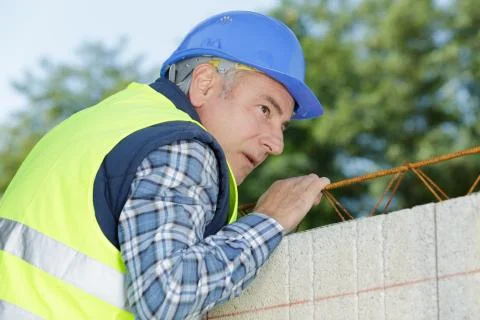 Construction worker at the construction site Stock Photos