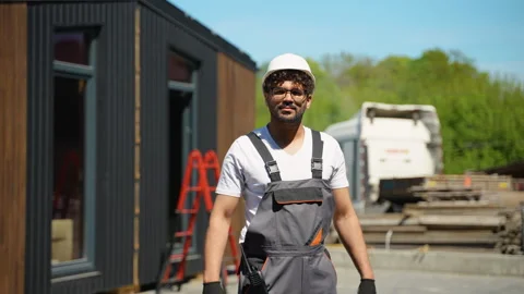 Construction worker crossing arms on building site Stock Footage 316712689