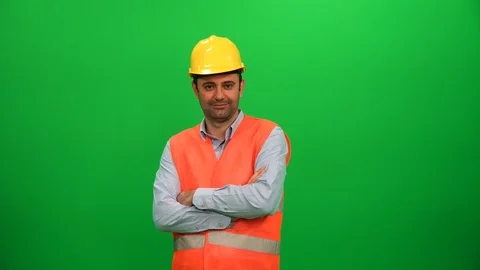 Construction Worker Crossing His Arms and Smiling on Green Screen Stock Footage 88652620