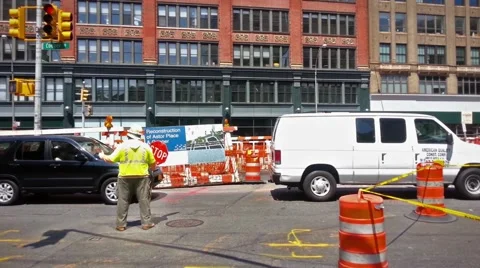 Construction Worker Directing Traffic Stock Footage 52239584