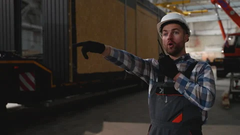 Construction worker directs SIP panel house transportation Stock Footage 301826788