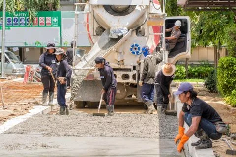 Construction worker is doing the road Stock Photos