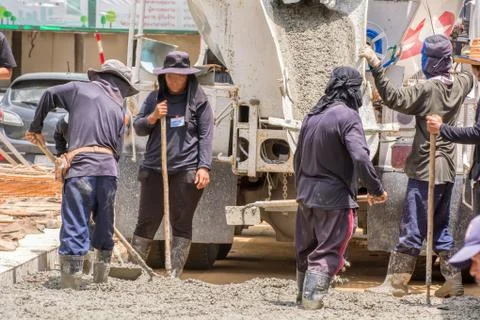 Construction worker is doing the road Stock Photos