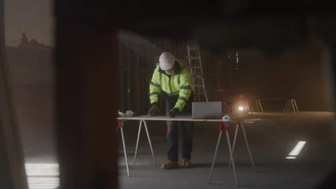 Construction Worker Draws Line With Ruler At Desk Stock Footage 270388882