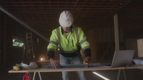 Construction Worker Draws On Paper On Desk Stock Footage 270388644
