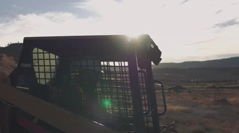 Construction worker driving machinery Stock Footage 55173311