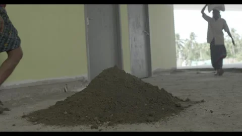 Construction worker dumping cement Stock Footage 300333928