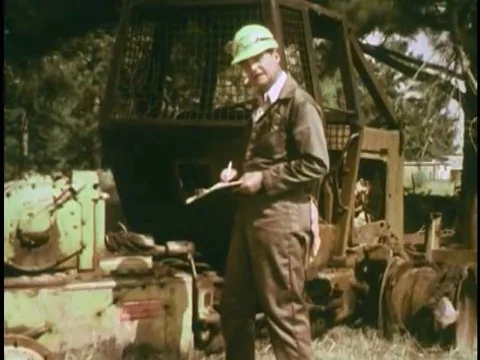 A construction worker explains that a spliced and taped battery cable caused a Stock Footage