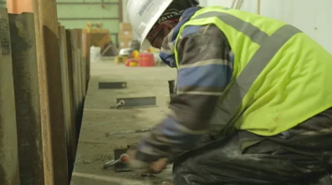 Construction Worker Fastening Bolt On Construction Site 3 Stock Footage 46590080