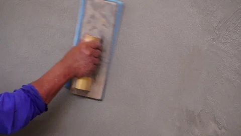 Construction worker finishing a wall  스톡 동영상 112949687