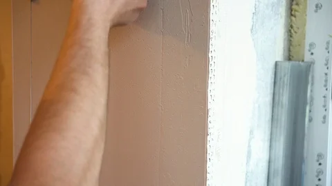 Construction worker finishing a wall, Stock Footage 118218974