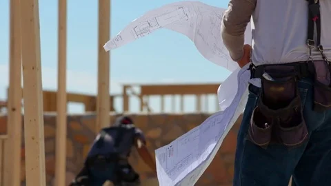 Construction Worker Flipping Through Blueprints Stock Footage 80832820