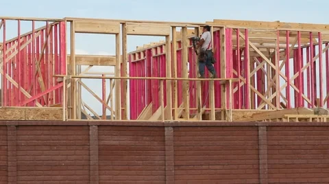 Construction Worker Framing Houses Stock Footage 50084565