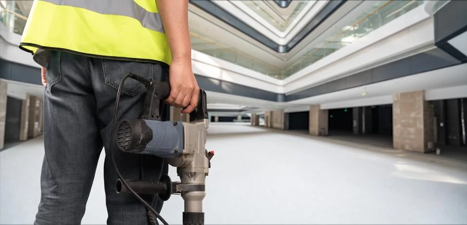 Construction Worker in front of construction site Stock Photos