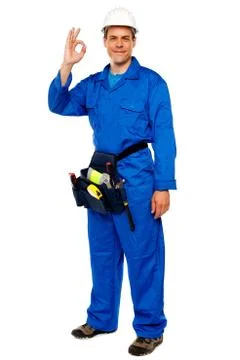 Construction worker gesturing okay sign Stock Photos