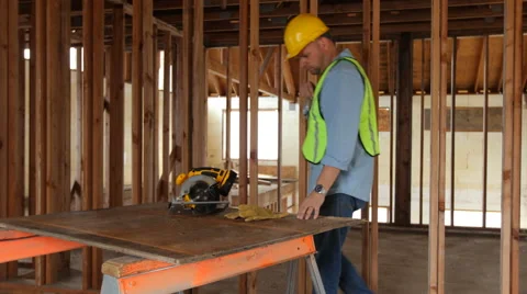 Construction worker getting ready to cut Stock Footage 47490564