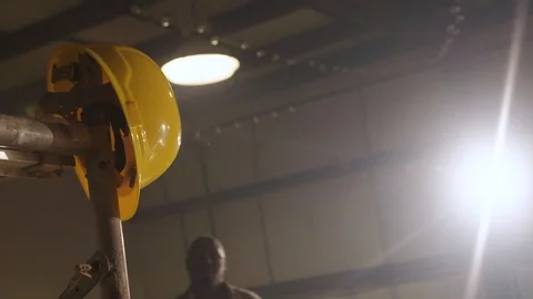 Construction Worker Grabs Hard Hat, Slow Motion Stock Footage 127329305