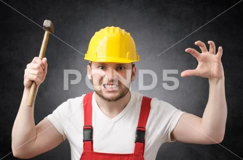 Construction worker with hammer Stock Photos