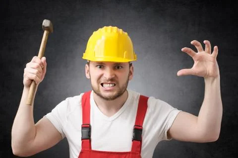 Construction worker with hammer Stock Photos
