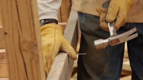Construction Worker Hammering in a Nail Stock Footage 81750178