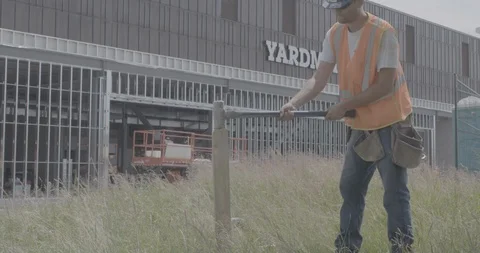 Construction Worker Hammering In Post Video stock 101660244