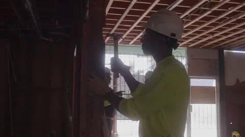 Construction Worker Hammering Wall Stock Footage 270392161
