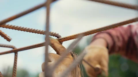 Construction worker hands tying rebar steel bars Stock Footage 341294608