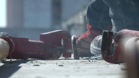 Construction Worker hands using Welding machinery iron metal sparking. Stock-Footage 346635798