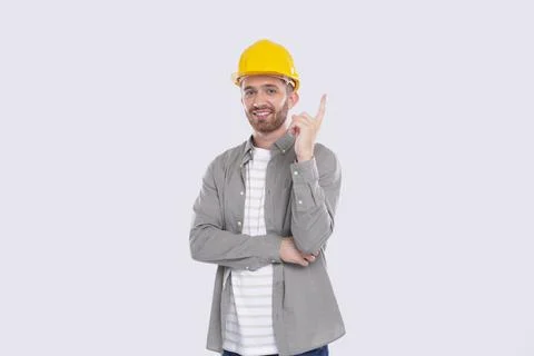 Construction Worker Having A Great Idea. Man with Idea Holding Finger Up. Worker Stock Photos