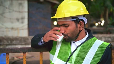 Construction Worker Having Tea While Reading Stock Footage 281335700