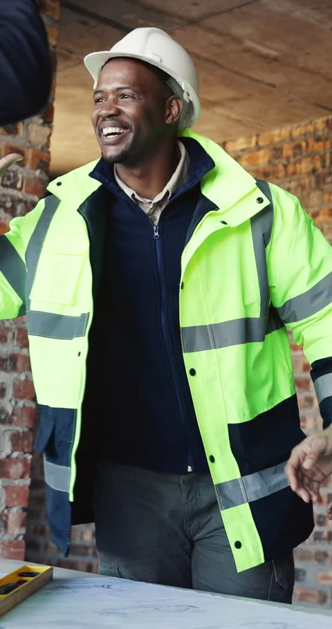 Construction worker, high five and men on site with building, repairs or Stock Footage 337030593