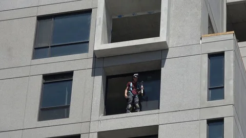 Construction worker on highrise building . Close up Stock Footage 89817425