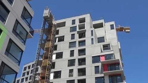 Construction worker on highrise building.Wide view Stock Footage 89817468