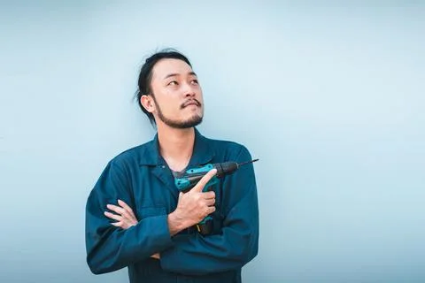 Construction Worker Holding Constructing Equipment Tools on Isolated Backgrou Stock Photos