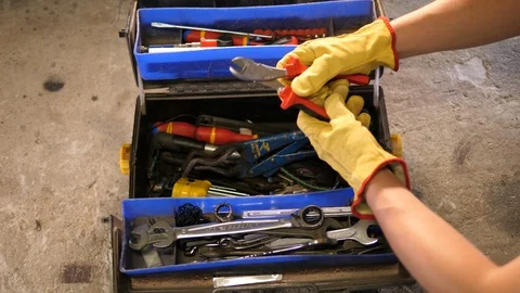 Construction worker holding Heavy-Duty cable Cutters Strippers. Cutting copper. 動画素材 126332251