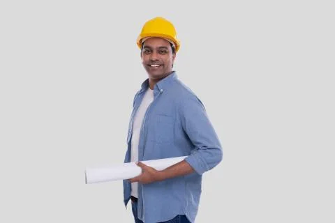 Construction Worker Holding House Plan in Hands. Architect Holding Blueprints Stock Photos