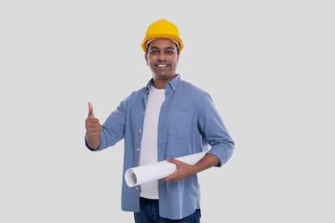 Construction Worker Holding House Plan in Hands Showing Thumb Up. Architect Stock Photos
