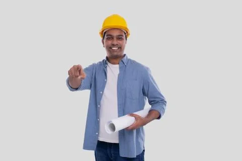 Construction Worker Holding House Plan in Hands Pointing in Camera. Architect Stock Photos