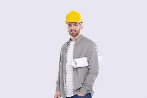 Construction Worker Holding House Plan in Hands. Architect Holding Blueprints Stock Photos