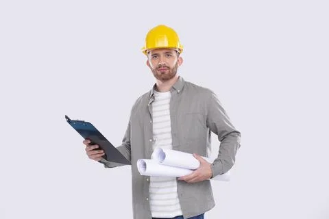 Construction Worker Holding House Plan and Clipboard in Hands. Architect Holding Stock Photos