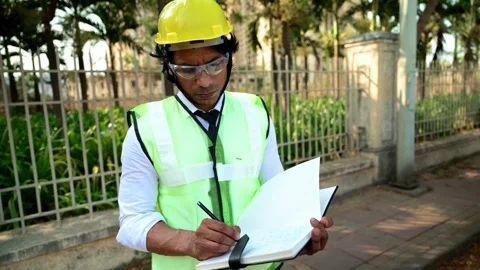 Construction worker holding a notebook Stock Footage 277036363